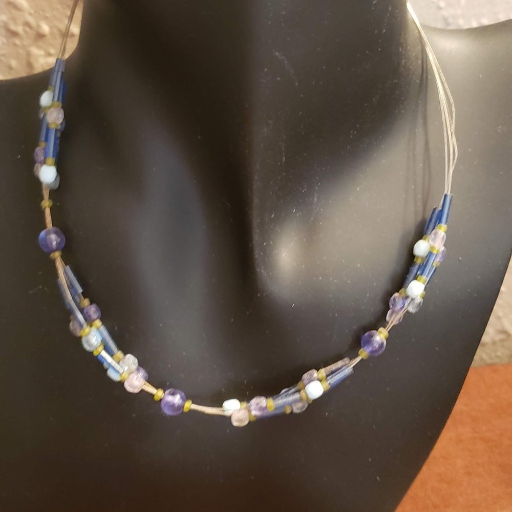 Silver short twisted necklace with green and blue beads